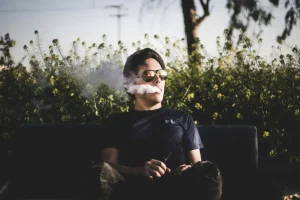 the man smokes
