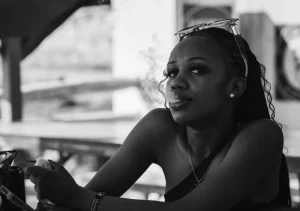 The woman smokes